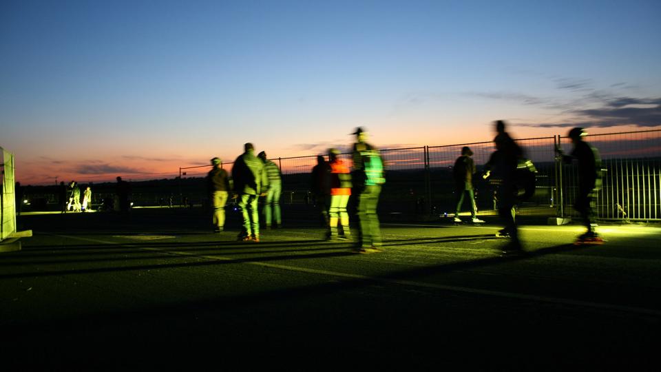 Workers on an airfield at a commercial airport