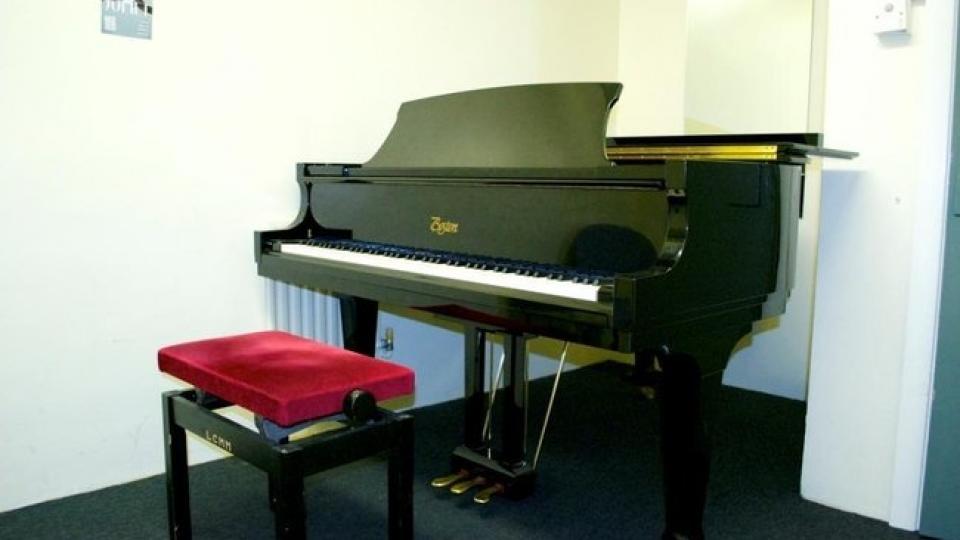 A Steinway piano in a basement practice room at LCM