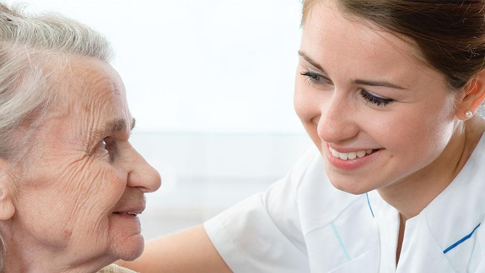 A nurse with her older patient