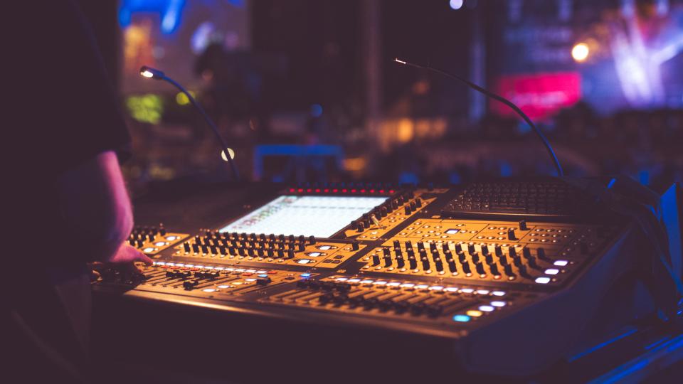 Illuminated mixing desk in a recording studio