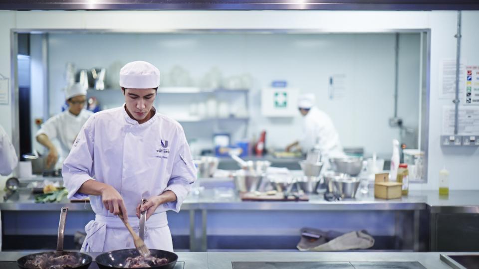 Chef working in commercial kitchen