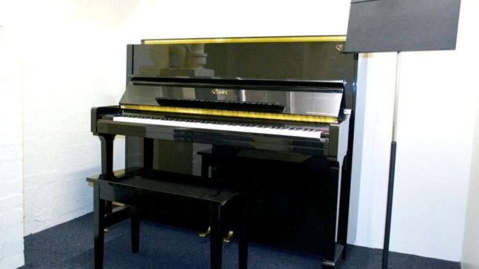 An upright Steinway piano