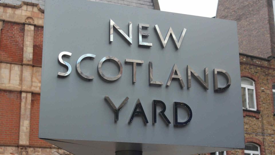 The New Scotland Yard sign at the Metropolitan Police Force headquaters