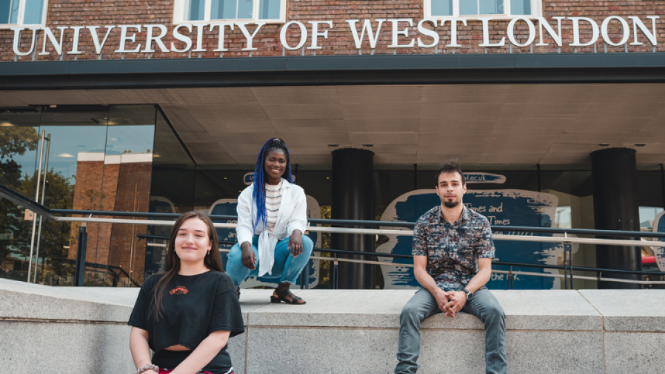 Students sitting on steps of UWL building - St mary's road SMR campus