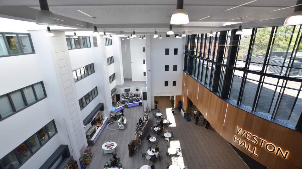 Birds eye view of UWL's heartspace - a cafe in a high ceiling open space