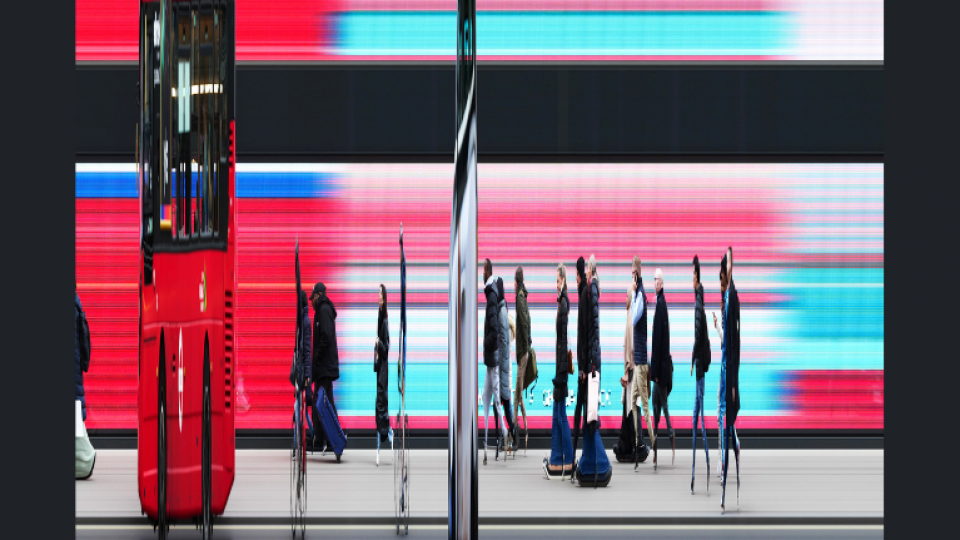 A warped photograph of people waiting for a bus with red and blue lines in the background.