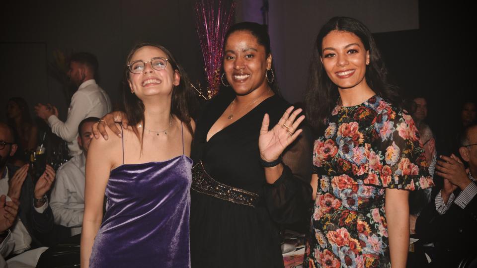 Olivia Parker-Smith, Prema Rebekah Kaur Sembi-Harding and Nekshia Alcee are are in formal dress at the Zest Quest Asia Awards ceremony.