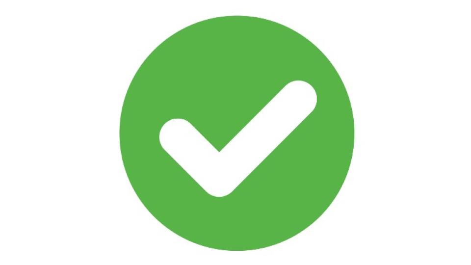 Graphic of a white tick against a green circle background