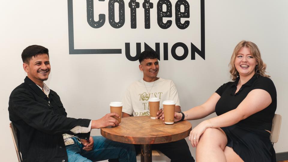 Three UWLSU Sabbs members sitting in the coffee union.