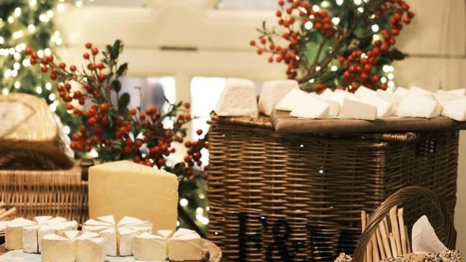 A Fortnum and Mason's hamper and assortment of cheeses and bread