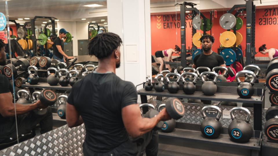 A student working out in the UWL Fitness Centre gym