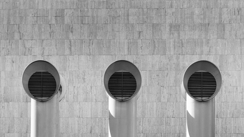 Three air vents on a building