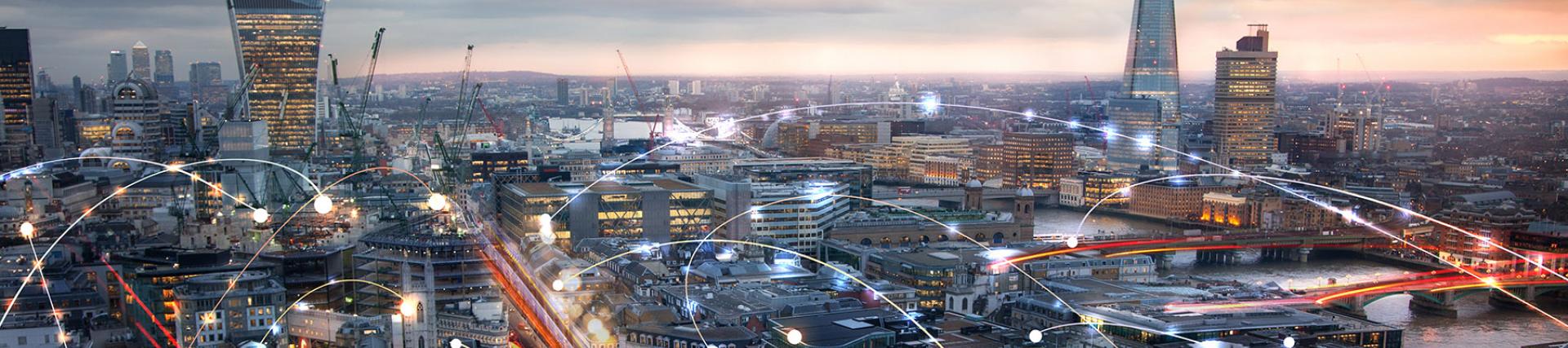 An aerial view of London, overlaid with network icons