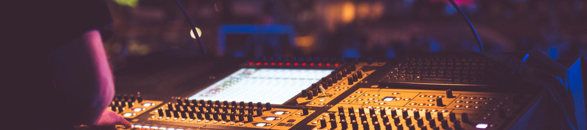Illuminated mixing desk in a recording studio