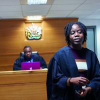 A law student in the mock courtroom at the University of West London