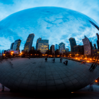 Large spherical mirror showing a cityscape 
