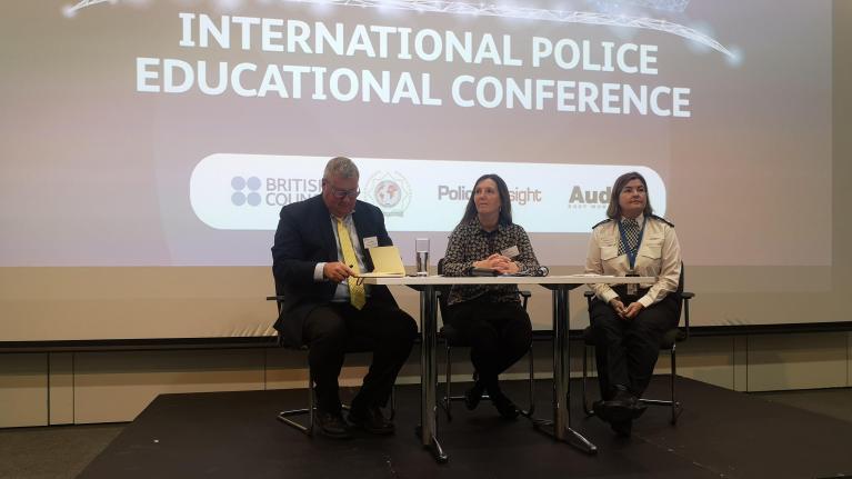 Three speakers sat on stage at the International Police Education Conference, hosted by UWL