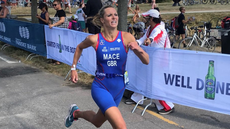Beki Mace running with blue sports clothes on.
