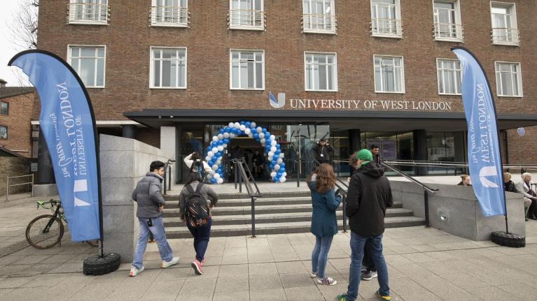 Entry point for the UWL applicant day event viewed from the outside with visitors entering.