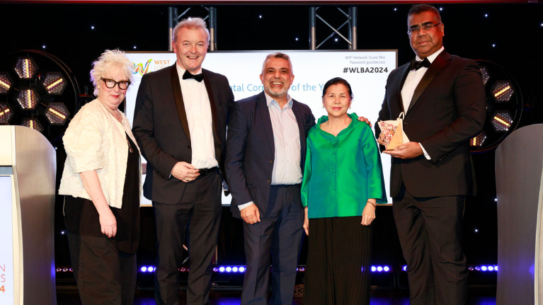West London Business Awards - showing UWL staff and host on stage at the ceremony.